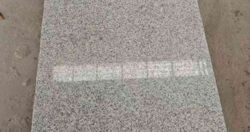 泰安芝麻白光面毛板